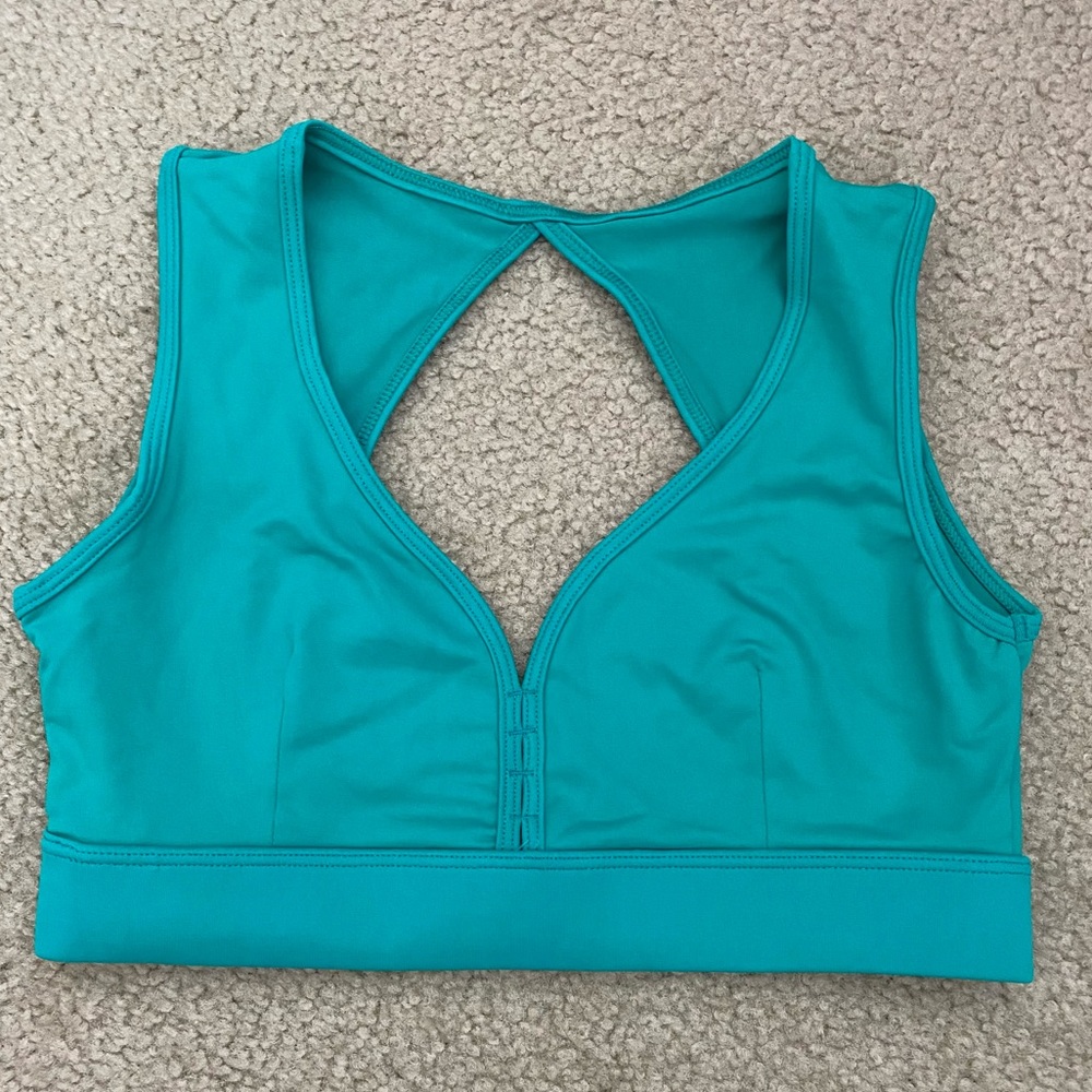 Teal green Liquido active brand sports bra size L.